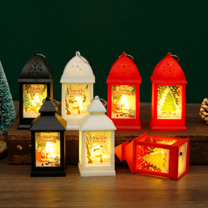 Set of colorful Christmas lanterns with glowing interior designs on a wooden surface.