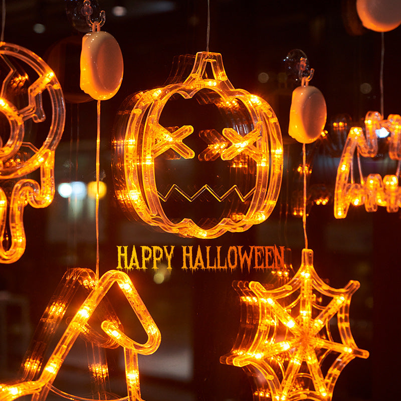 Decorative Halloween lights with a jack-o'-lantern design and 'Happy Halloween' text.