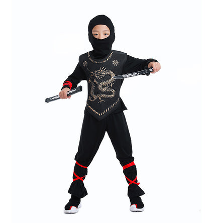 Child in a black ninja costume with a hood and mask, holding a sword on a white background.
