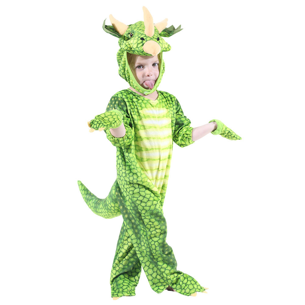 Child wearing a green dinosaur costume on a white background