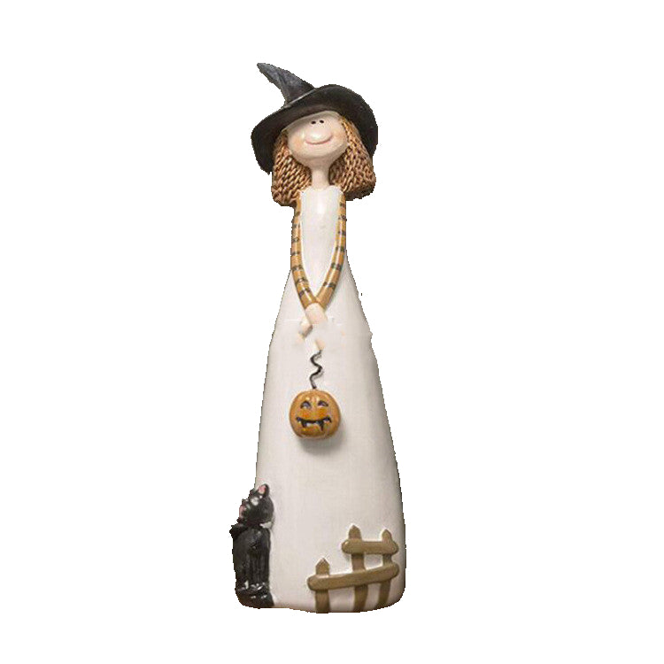 Hand-painted resin witch figurine with spooky details