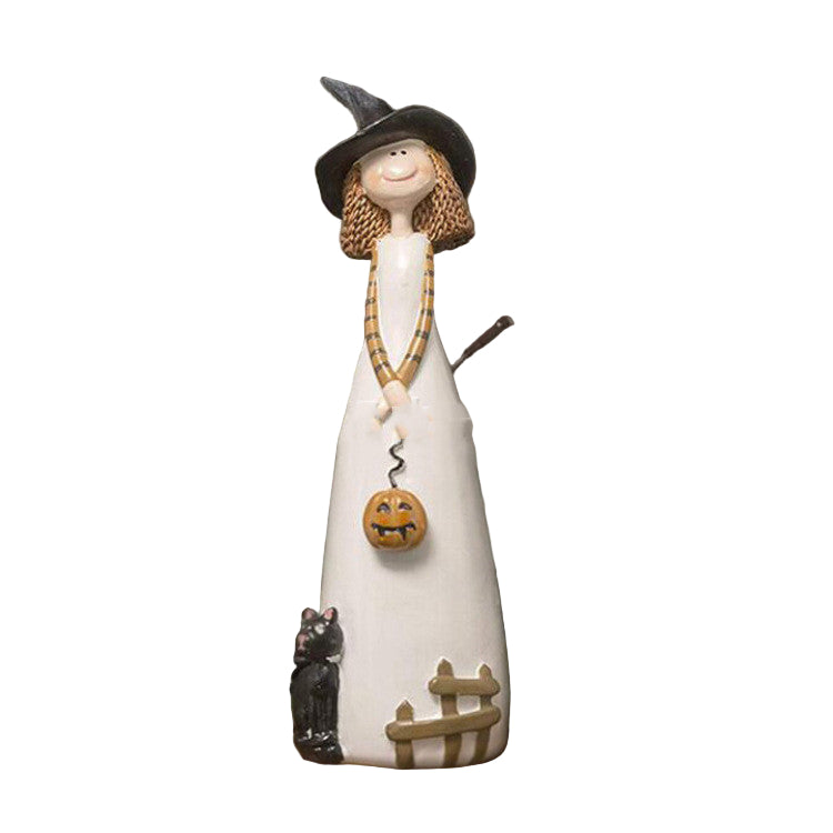 Small resin witch decoration for Halloween mantel and table setup