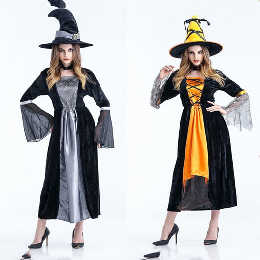 Two women wearing Halloween witch costumes on a white background